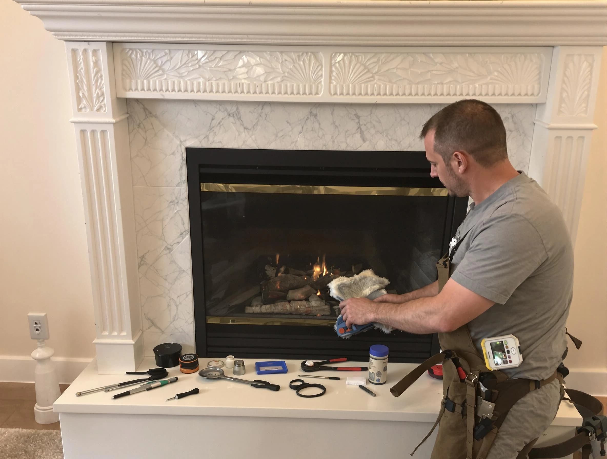 Fountain Hills Chimney Sweep performing fireplace maintenance in Fountain Hills, AZ